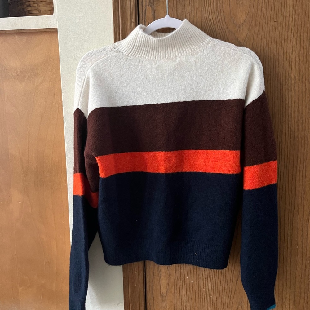 Women’s H&M sweater never worn. Cream, maroon, navy, and dark orange strip.